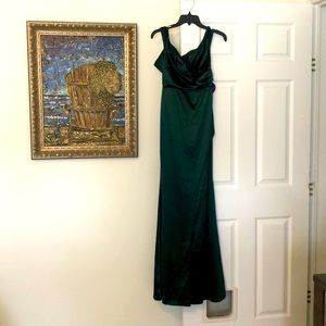 Long emerald green, satin dress.